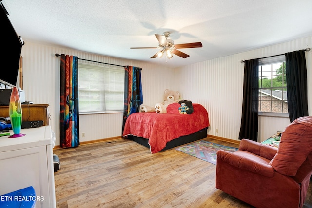 8000 Berkshire Blvd, Powell, TN 37849 - bedroom featuring light wood-style floors, baseboards, and ceiling fan