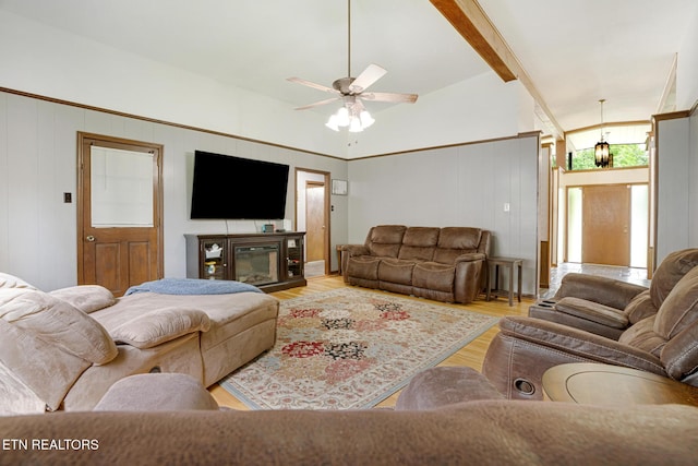 8000 Berkshire Blvd, Powell, TN 37849 - living area with wood finished floors, a ceiling fan, a glass covered fireplace, and a decorative wall