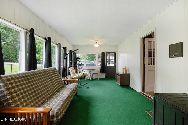 8000 Berkshire Blvd, Powell, TN 37849 - sunroom featuring a ceiling fan, carpet flooring, and wooden walls