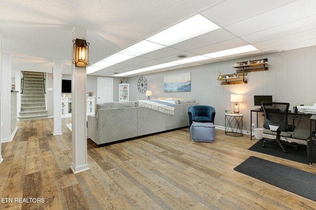 8000 Berkshire Blvd, Powell, TN 37849 - living room featuring wood finished floors, stairway, a desk, and baseboards