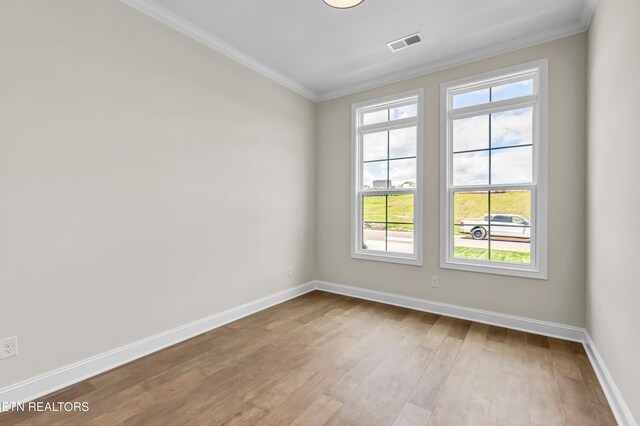 1123 Branch Hook Rd, Knoxville, TN 37934 - unfurnished room featuring ornamental molding, baseboards, and wood finished floors