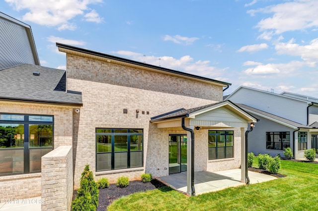 1123 Branch Hook Rd, Knoxville, TN 37934 - rear view of house featuring a patio, brick siding, and a yard