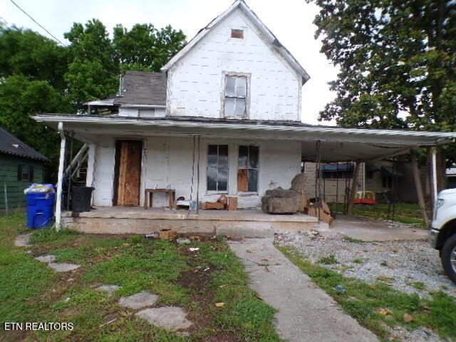 941 Unaka St, Harriman, TN 37748 - view of front facade with covered porch