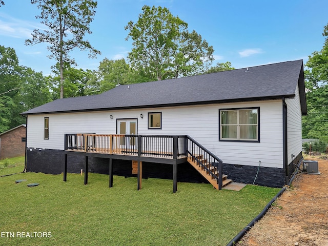 back of house with a deck, a yard, crawl space, and a shingled roof