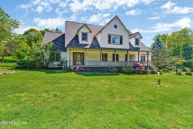 11 Kingsboro Ln, Crossville, TN 38558 - view of front of house with a porch, a front lawn, and a shingled roof