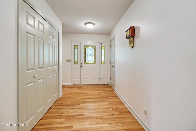 11 Kingsboro Ln, Crossville, TN 38558 - doorway featuring light wood-type flooring and baseboards