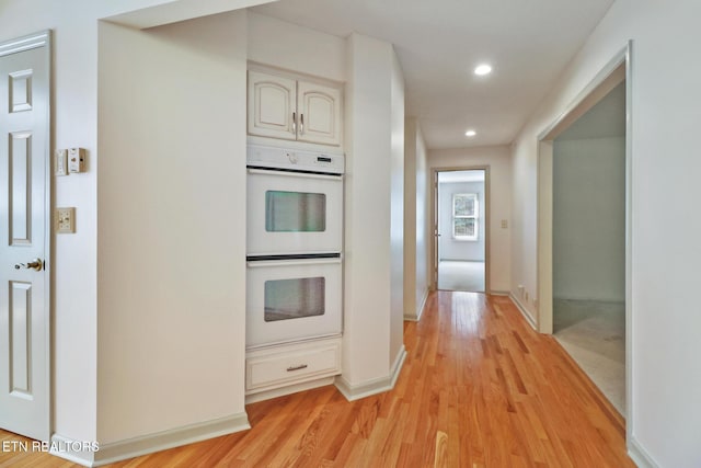 11 Kingsboro Ln, Crossville, TN 38558 - kitchen with double oven, light wood-type flooring, recessed lighting, and baseboards