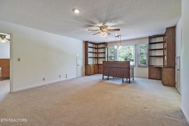 11 Kingsboro Ln, Crossville, TN 38558 - sitting room with a ceiling fan, light carpet, baseboards, and a textured ceiling