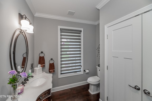 109 Niwodihi Trl, Vonore, TN 37885 - bathroom with baseboards, wood finished floors, ornamental molding, vanity, and toilet