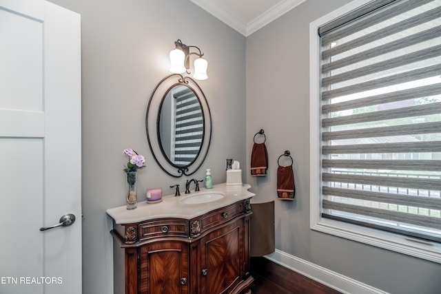109 Niwodihi Trl, Vonore, TN 37885 - bathroom featuring baseboards, ornamental molding, wood finished floors, and vanity