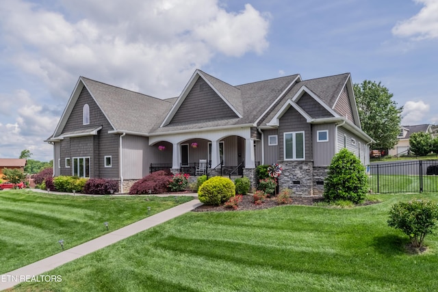 109 Niwodihi Trl, Vonore, TN 37885 - craftsman inspired home featuring a porch, a shingled roof, and stone siding
