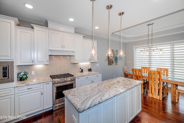 109 Niwodihi Trl, Vonore, TN 37885 - kitchen featuring stainless steel appliances, a kitchen island, backsplash, white cabinets, and dark wood-type flooring