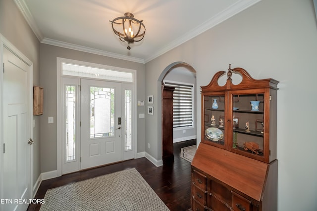 109 Niwodihi Trl, Vonore, TN 37885 - entrance foyer with dark wood finished floors, arched walkways, baseboards, crown molding, and a chandelier