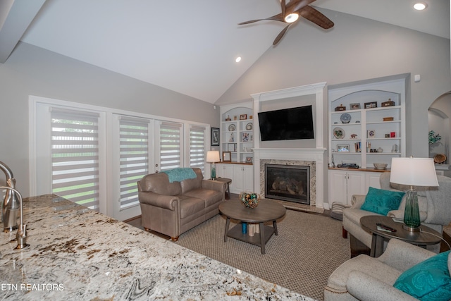 109 Niwodihi Trl, Vonore, TN 37885 - living area featuring a ceiling fan, a fireplace, high vaulted ceiling, built in features, and recessed lighting