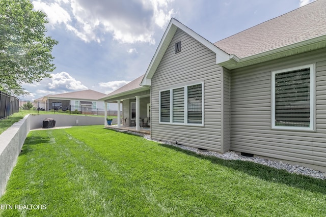 109 Niwodihi Trl, Vonore, TN 37885 - back of house featuring roof with shingles, a patio area, and crawl space