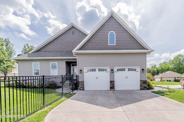 109 Niwodihi Trl, Vonore, TN 37885 - craftsman-style home featuring driveway and stone siding