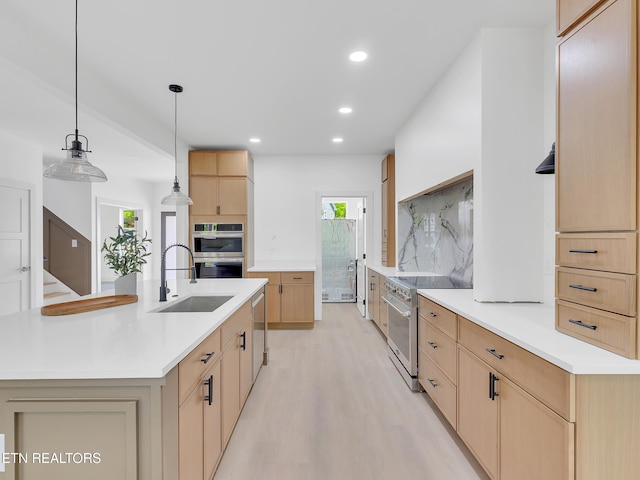 1715 Serene Cove Way, Knoxville, TN 37920 - kitchen with stainless steel appliances, light brown cabinets, a sink, and recessed lighting