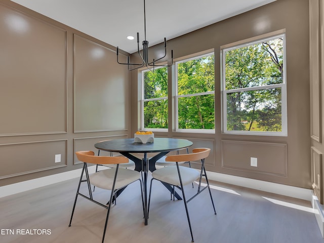 1715 Serene Cove Way, Knoxville, TN 37920 - dining space featuring a decorative wall, a chandelier, light wood finished floors, and recessed lighting