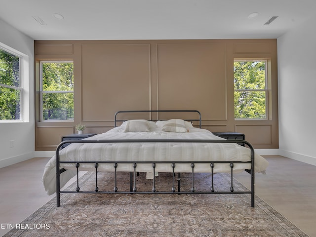1715 Serene Cove Way, Knoxville, TN 37920 - bedroom with a decorative wall, baseboards, wood finished floors, and recessed lighting