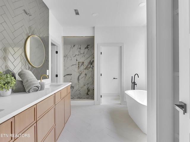 1715 Serene Cove Way, Knoxville, TN 37920 - bathroom with a marble finish shower, double vanity, a freestanding bath, and recessed lighting