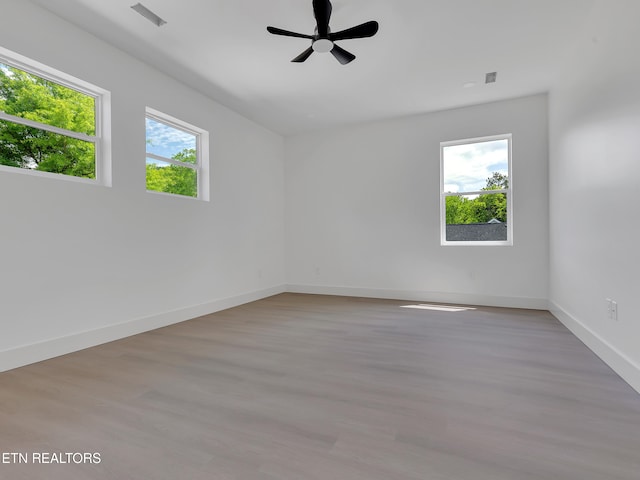 1715 Serene Cove Way, Knoxville, TN 37920 - spare room featuring baseboards, light wood finished floors, and ceiling fan