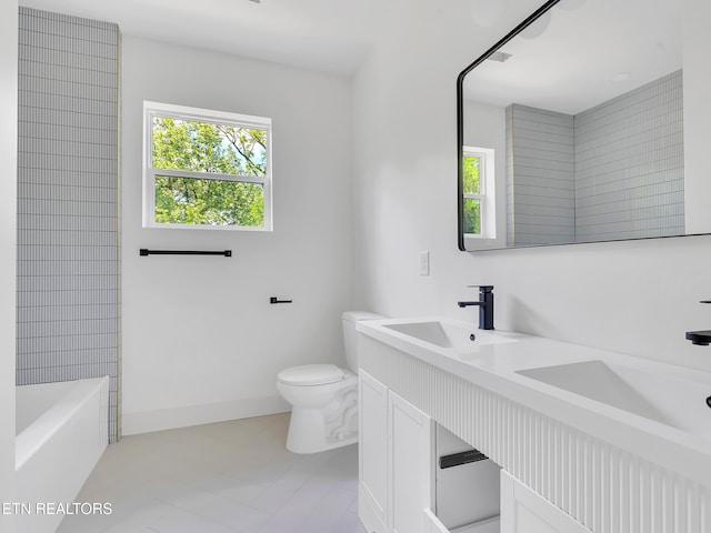 1715 Serene Cove Way, Knoxville, TN 37920 - bathroom featuring toilet, double vanity, baseboards, and tile patterned floors