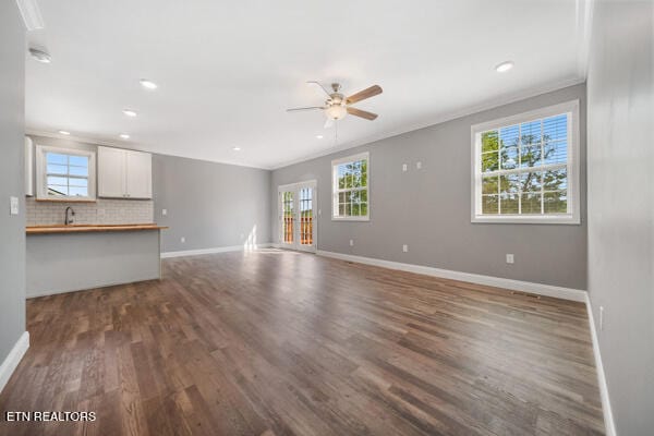 3966 Mountain Vista Rd, Knoxville, TN 37931 - unfurnished living room with ceiling fan, crown molding, baseboards, dark wood-style floors, and recessed lighting