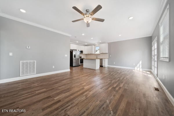 3966 Mountain Vista Rd, Knoxville, TN 37931 - unfurnished living room with ornamental molding, ceiling fan, plenty of natural light, dark wood finished floors, and baseboards