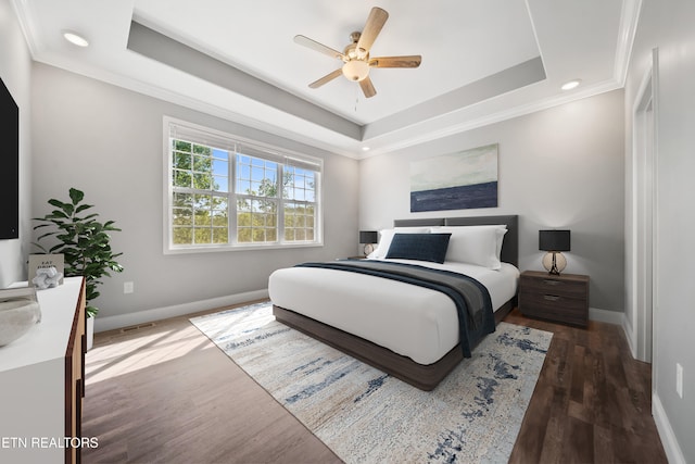 3966 Mountain Vista Rd, Knoxville, TN 37931 - bedroom featuring ornamental molding, baseboards, a tray ceiling, wood finished floors, and recessed lighting
