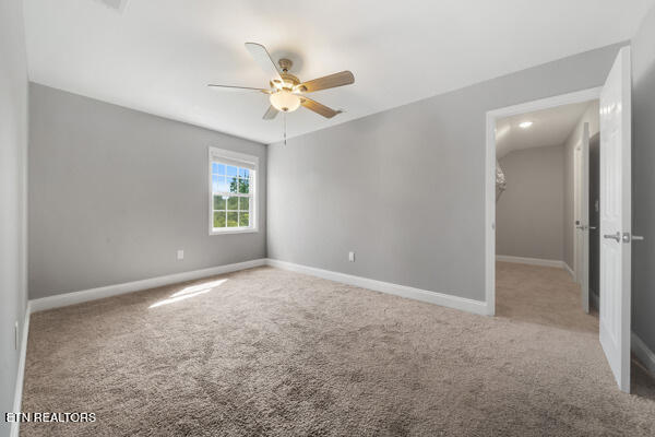 3966 Mountain Vista Rd, Knoxville, TN 37931 - carpeted empty room featuring ceiling fan and baseboards
