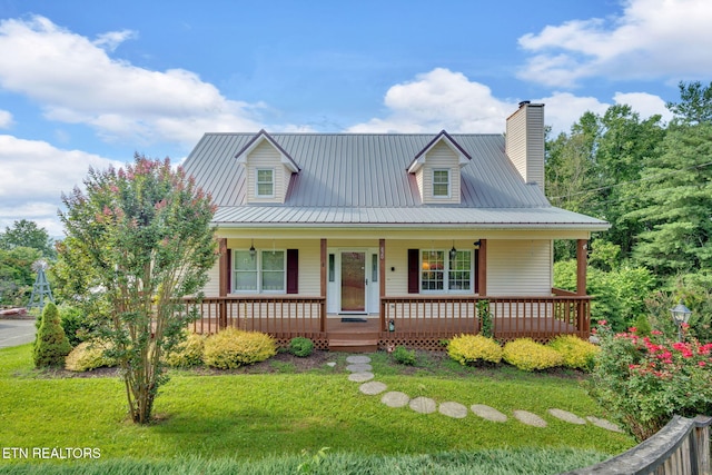 4820 Edens View Rd, Kingsport, TN 37664 - view of front of property featuring a front lawn, a metal roof, and a porch