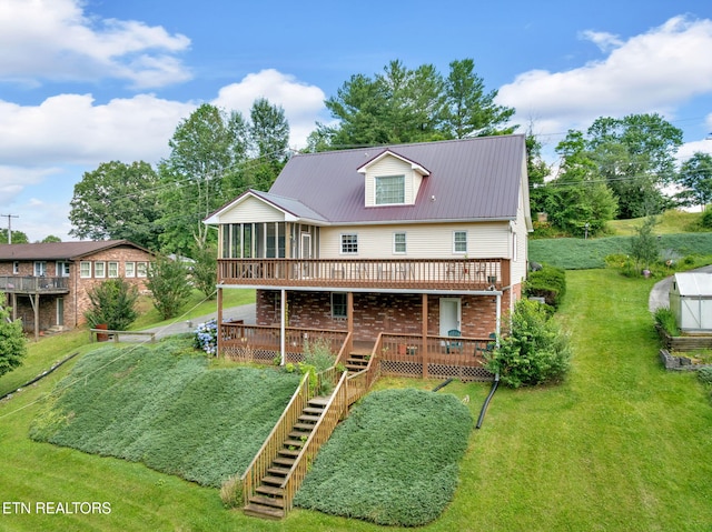 4820 Edens View Rd, Kingsport, TN 37664 - back of house featuring a wooden deck, a sunroom, stairway, and a lawn