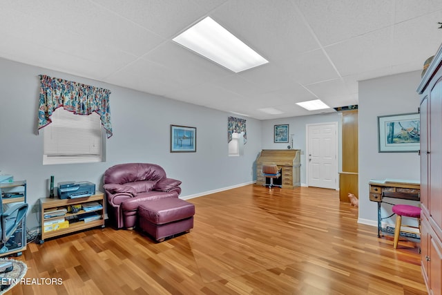 4820 Edens View Rd, Kingsport, TN 37664 - living area featuring light wood finished floors and a paneled ceiling