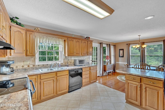 4820 Edens View Rd, Kingsport, TN 37664 - kitchen with black dishwasher, a chandelier, light countertops, healthy amount of natural light, and a textured ceiling