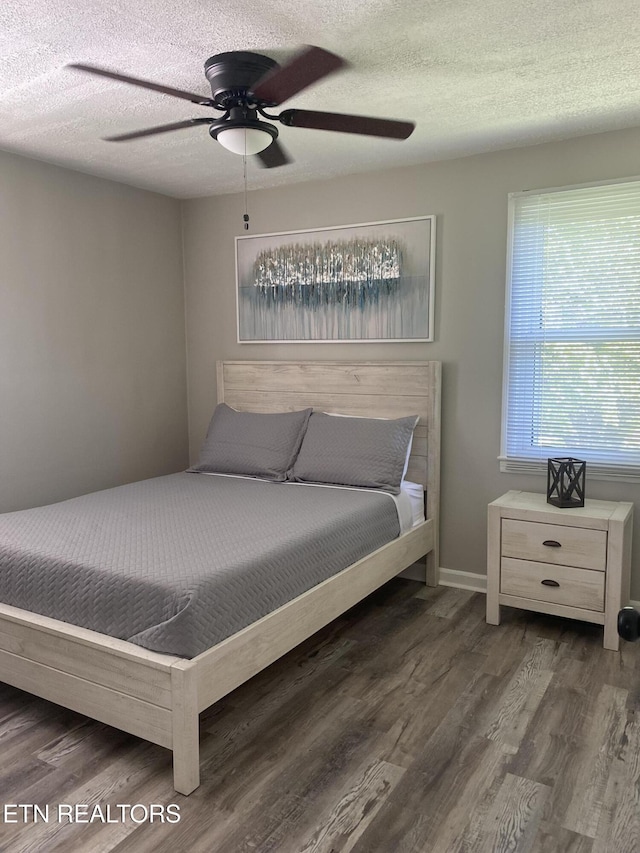 2010 Fine Ave, Knoxville, TN 37917 - bedroom with a textured ceiling, wood finished floors, a ceiling fan, and baseboards