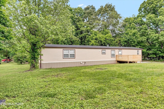 180 County Rd 853, Delano, TN 37325 - manufactured / mobile home with a front yard and a deck