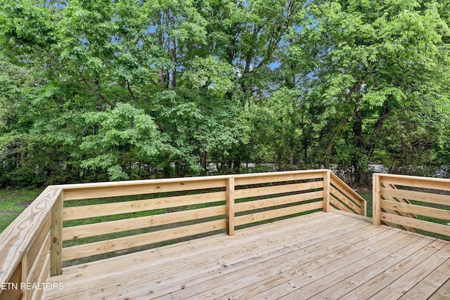 180 County Rd 853, Delano, TN 37325 - wooden deck with view of wooded area