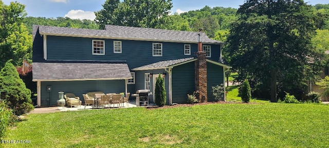 131 Chestnut Hill Rd, Oak Ridge, TN 37830 - view of front of house featuring a patio and a front yard