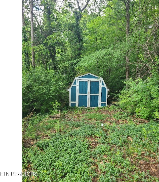 131 Chestnut Hill Rd, Oak Ridge, TN 37830 - view of shed with a view of trees