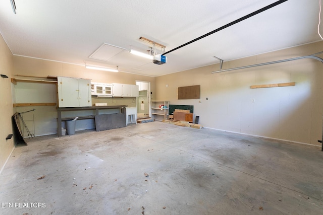 122 Mariners Dr, Crossville, TN 38558 - garage featuring a garage door opener