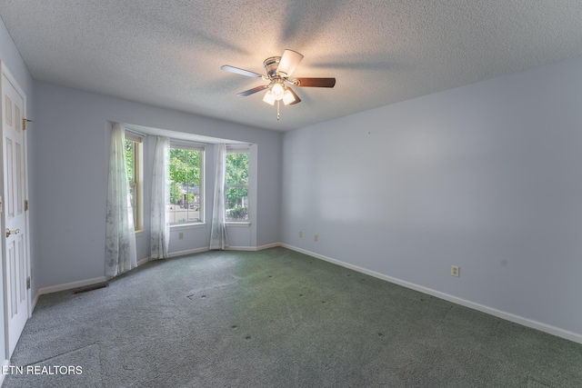 122 Mariners Dr, Crossville, TN 38558 - spare room featuring ceiling fan, carpet flooring, a textured ceiling, and baseboards