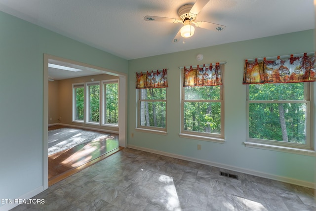 122 Mariners Dr, Crossville, TN 38558 - unfurnished dining area featuring baseboards and a ceiling fan