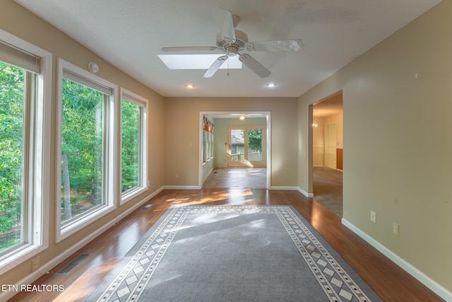 122 Mariners Dr, Crossville, TN 38558 - spare room featuring wood finished floors, ceiling fan, and baseboards