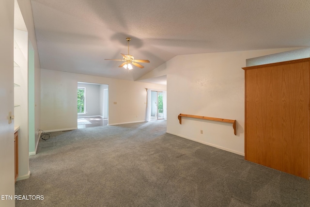 122 Mariners Dr, Crossville, TN 38558 - carpeted spare room with a ceiling fan, vaulted ceiling, baseboards, and a textured ceiling