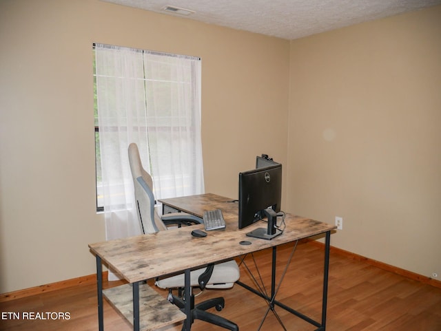 643 Airport Rd, Oakdale, TN 37829 - office with baseboards, wood finished floors, and a textured ceiling