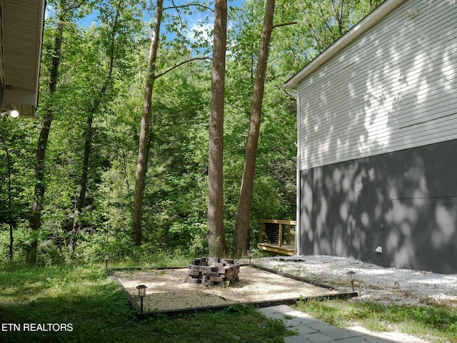643 Airport Rd, Oakdale, TN 37829 - view of yard with an outdoor fire pit