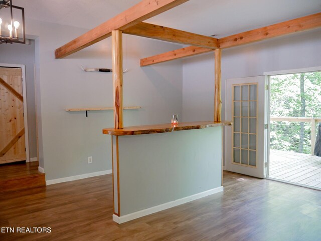 643 Airport Rd, Oakdale, TN 37829 - bar area featuring wood finished floors, a chandelier, baseboards, and beam ceiling