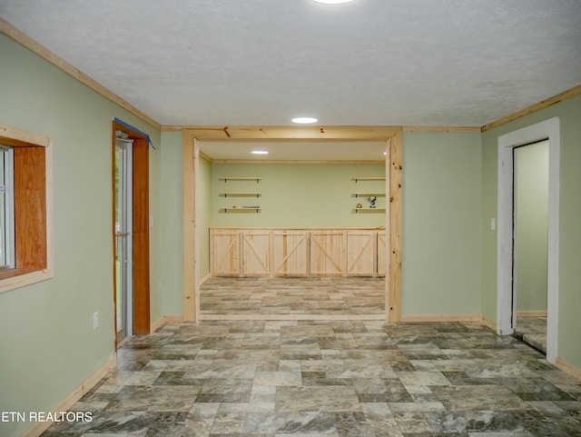 643 Airport Rd, Oakdale, TN 37829 - corridor with baseboards, stone finish flooring, ornamental molding, and recessed lighting