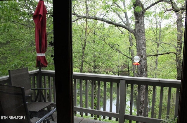 281 Moytoy Rd Unit 206, Crab Orchard, TN 37723 - wooden deck featuring a wooded view