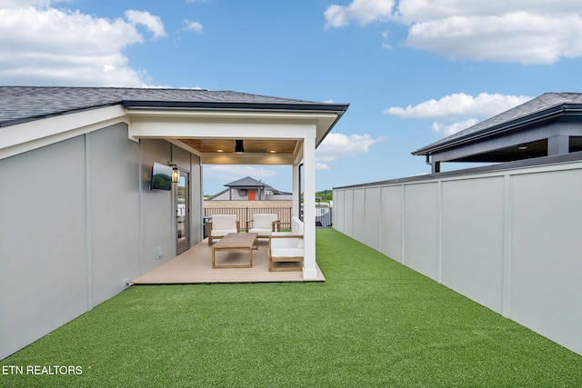 view of yard featuring an outdoor hangout area and a deck